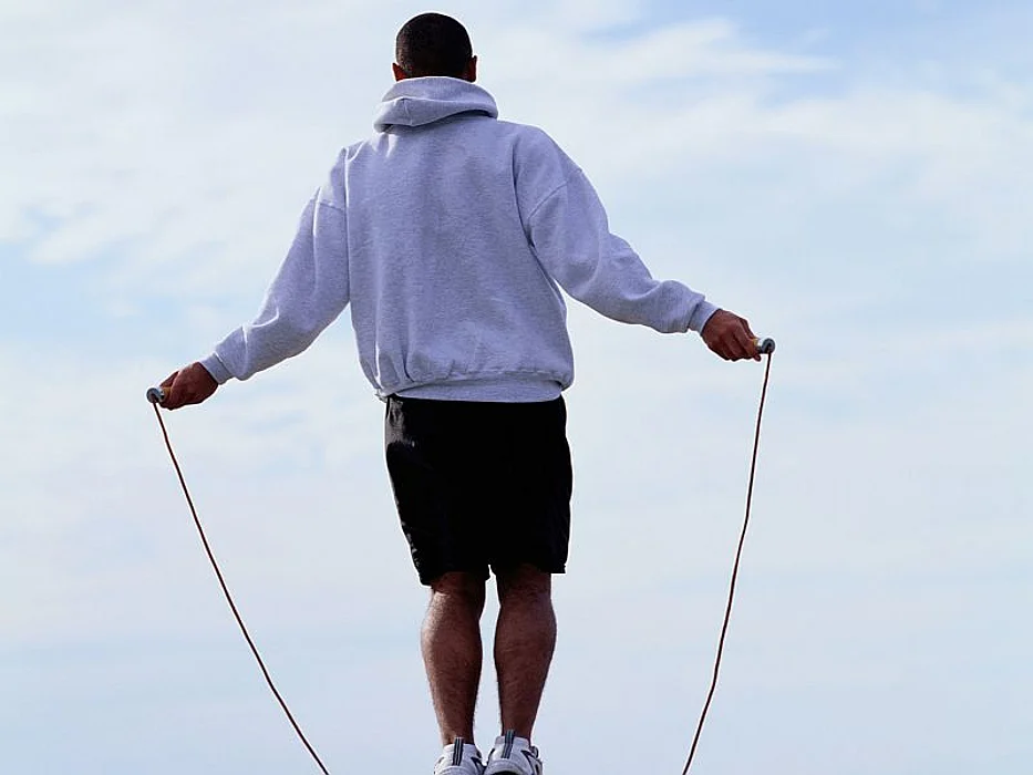 man jumping rope