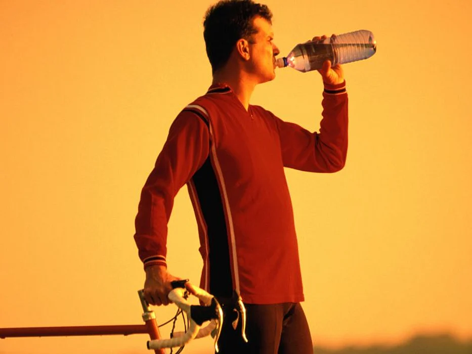 man drinking water