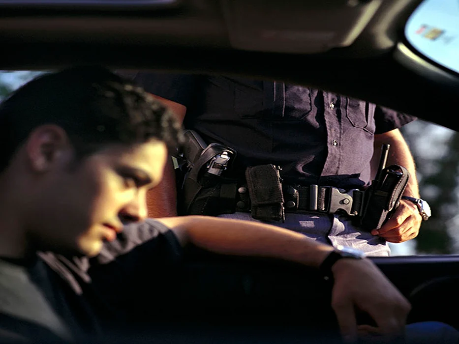 police officer stopping the car