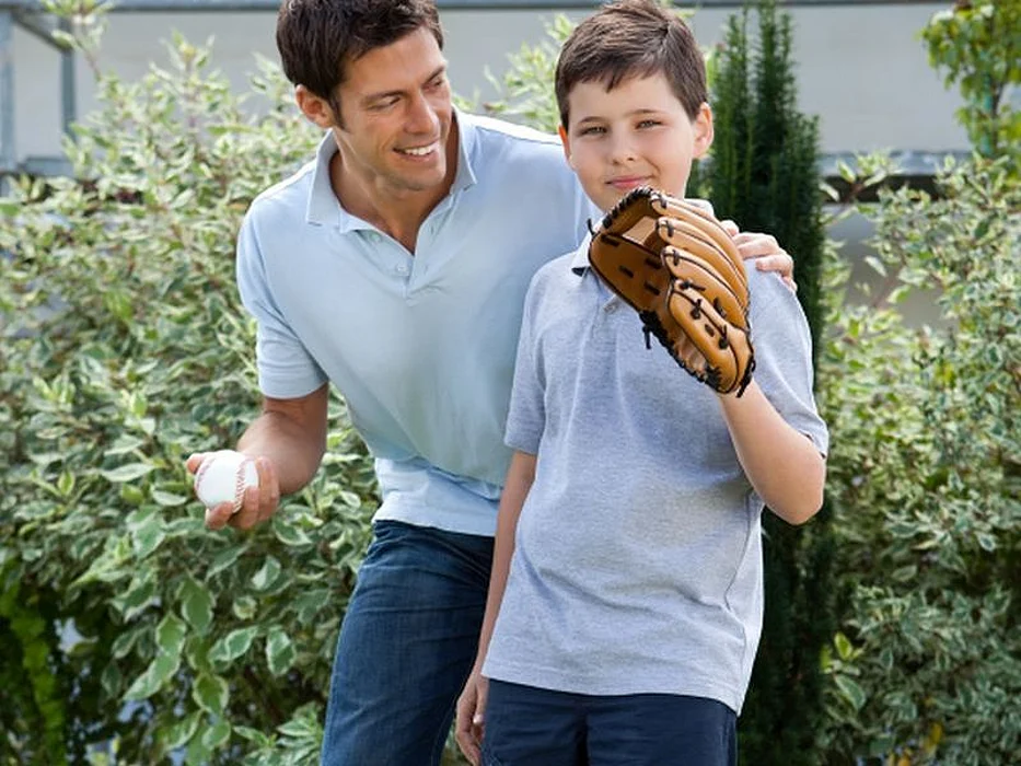 dad and son playing baseball