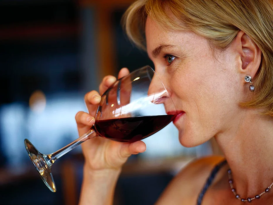 woman drinking red wine