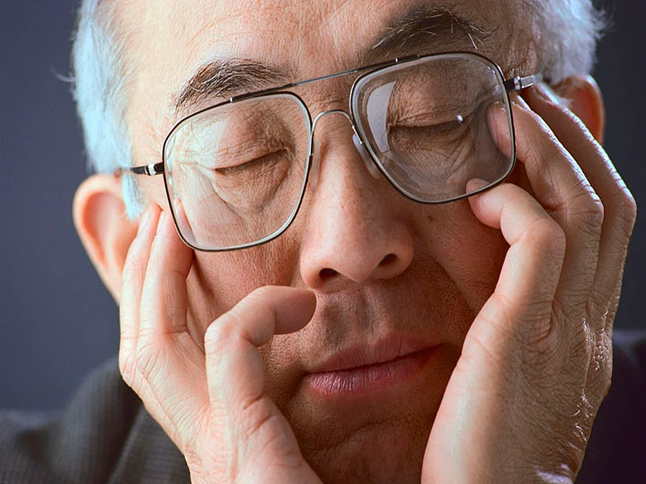 man asleep sitting