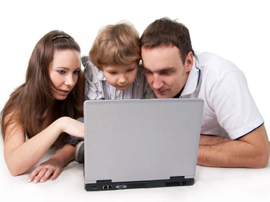 family using computer