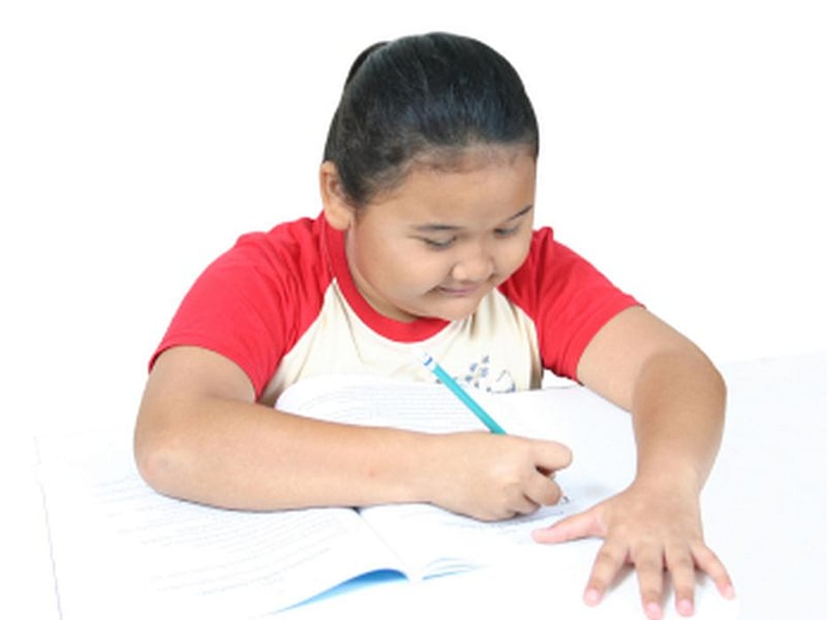 fat child writing something