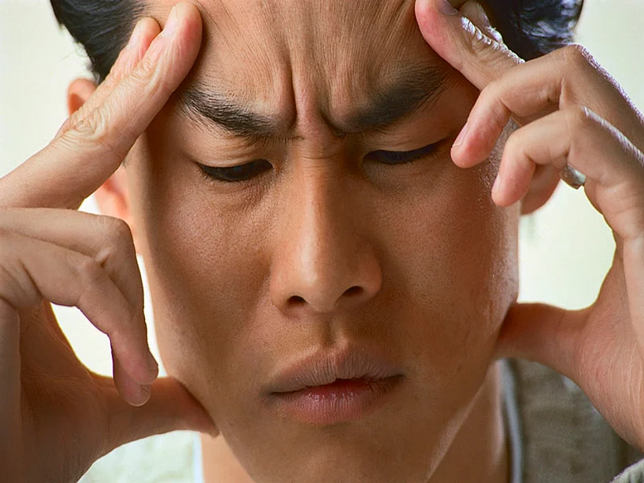 man with a headache