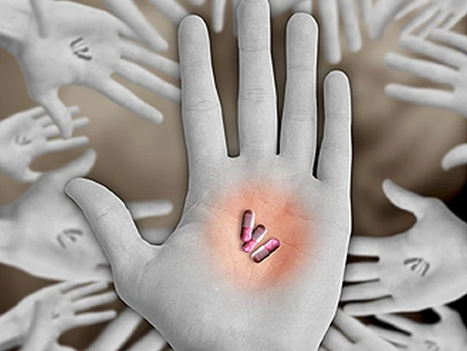 pills on a hand palm