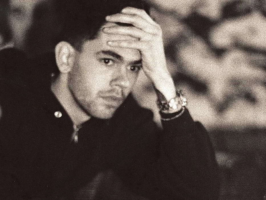 man holding his head