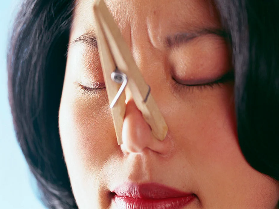 woman with a clip on her nose