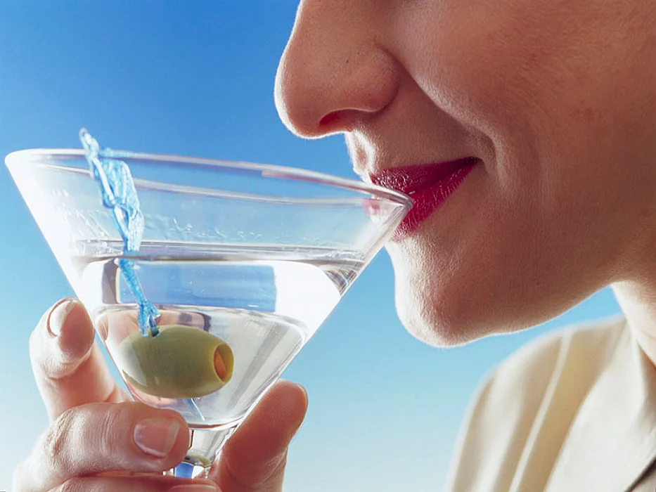 woman drinking martini