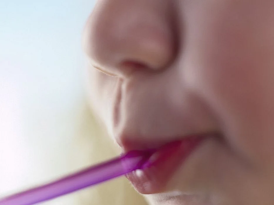 sipping through a straw