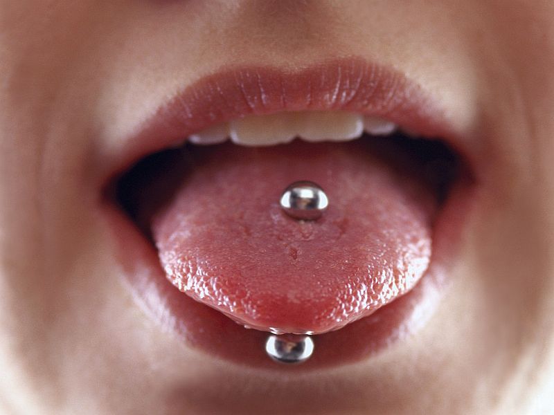 News Picture: Tongue, Lip Piercings May Harm Teeth and Gums