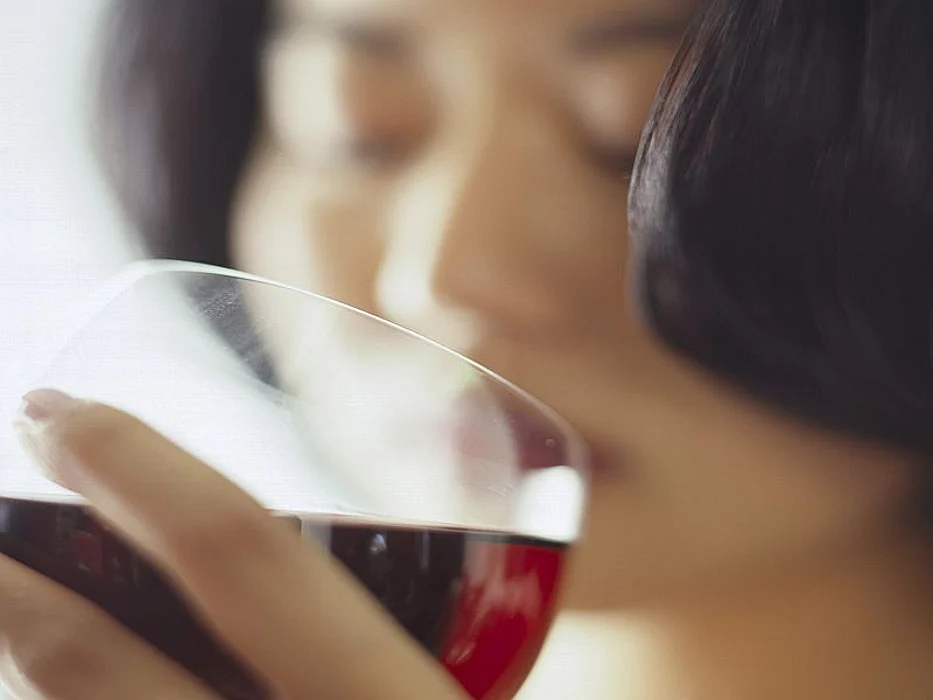 woman drinking red wine