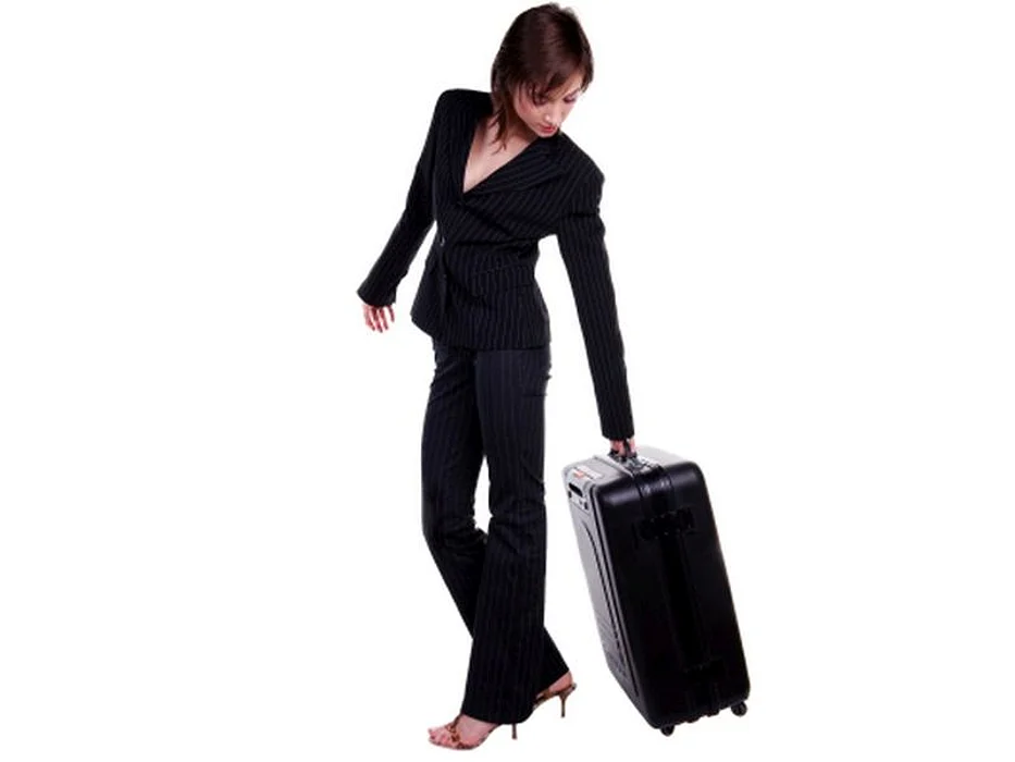 woman pulling luggage