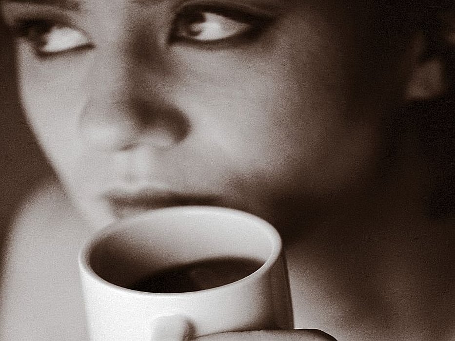 woman drinking coffee