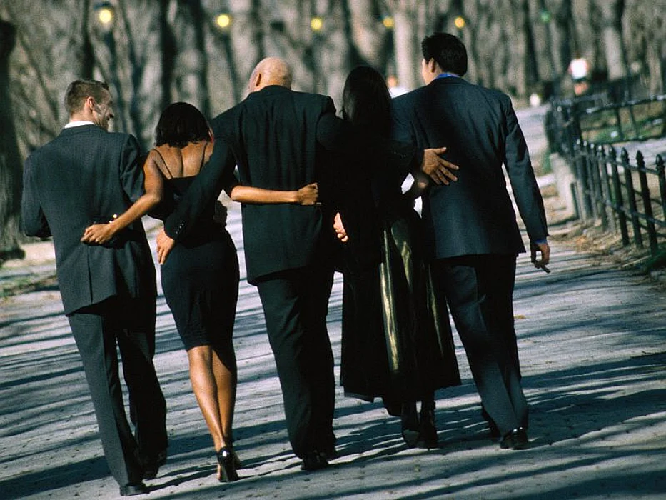 a group of people going to the party