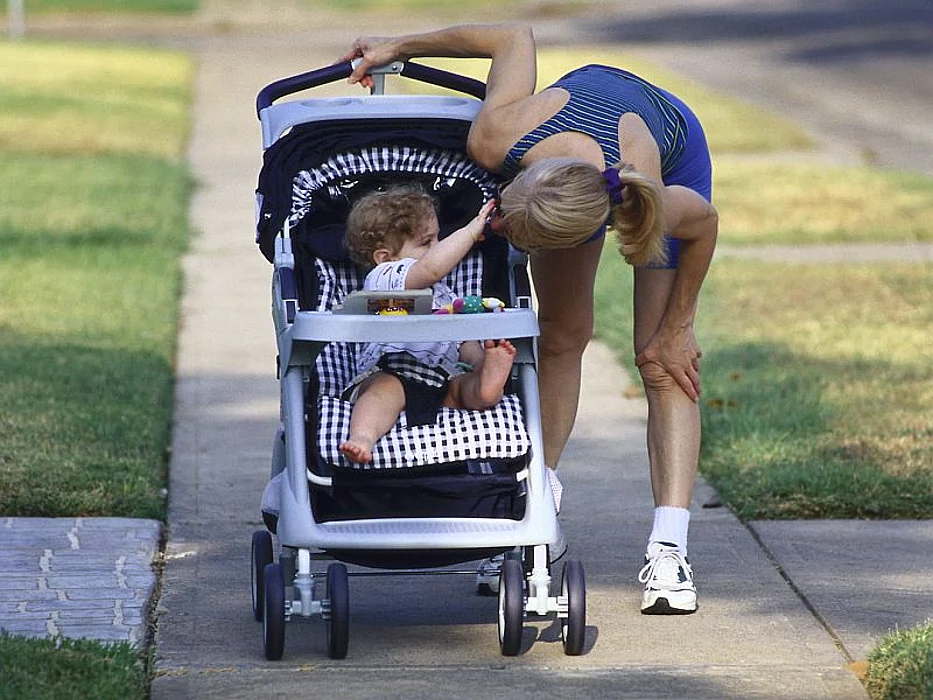 mother and infant in baby stroller