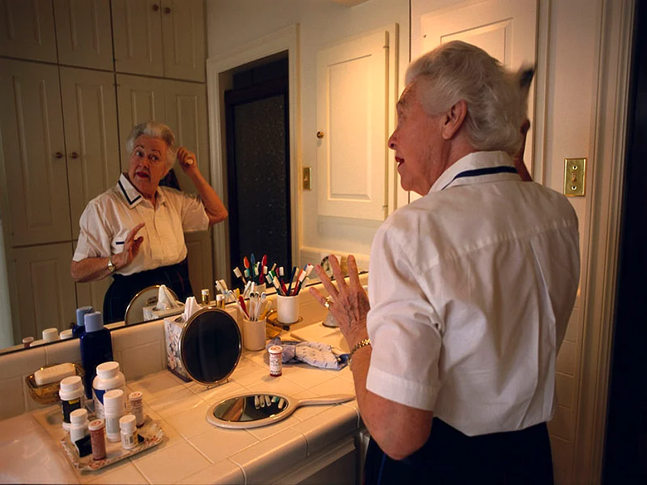 woman applying makeup