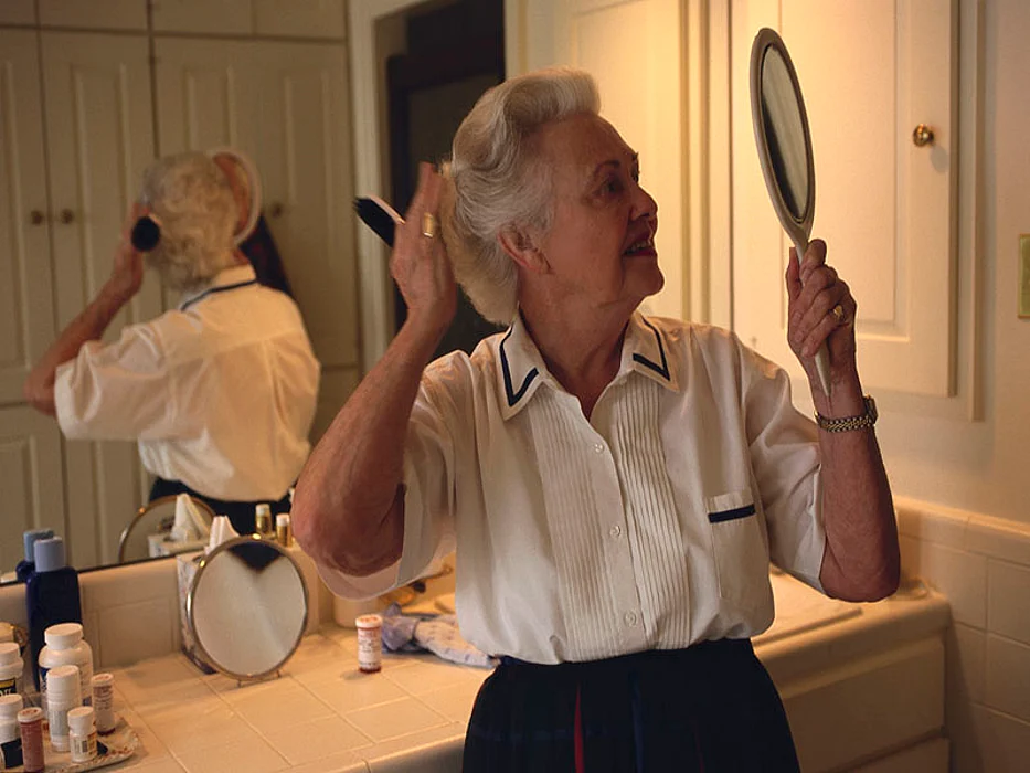 woman brushing her hair