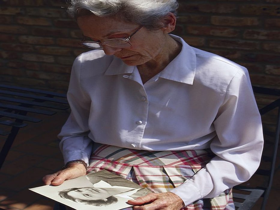 woman looking at photos
