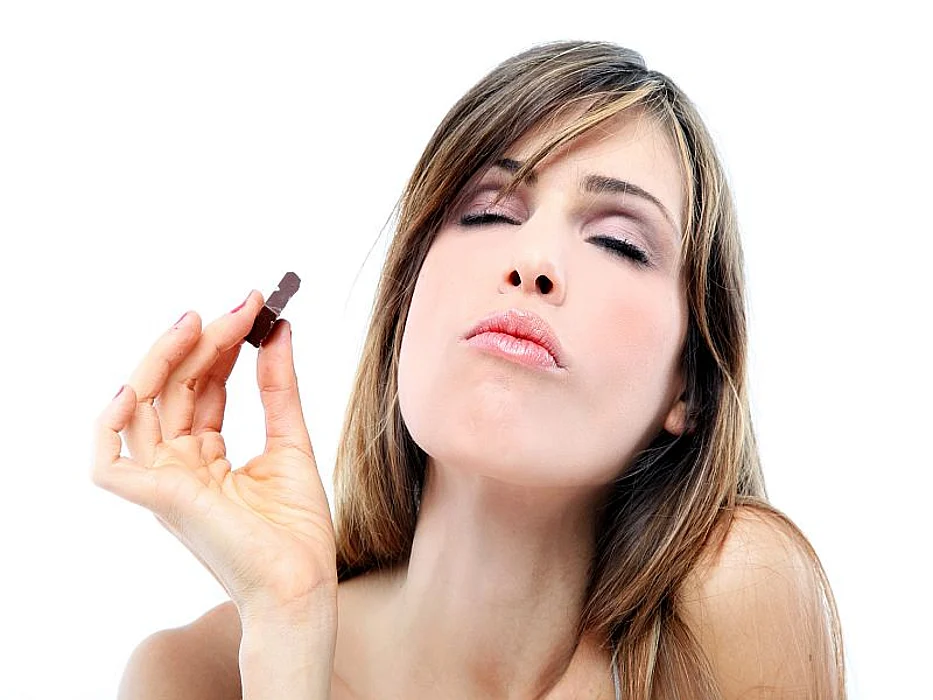woman eating chocolate