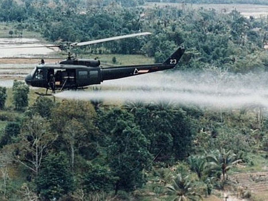 U.S. helicopter spraying agent orange during Vietnam War