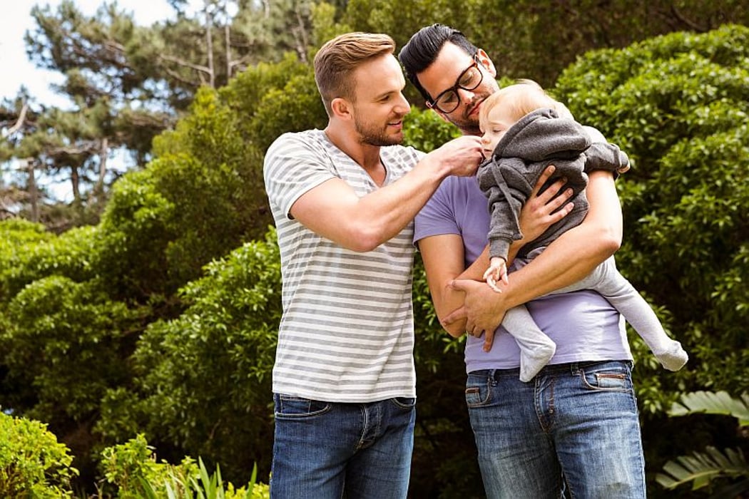male couple and child