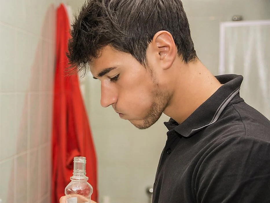 man gargling