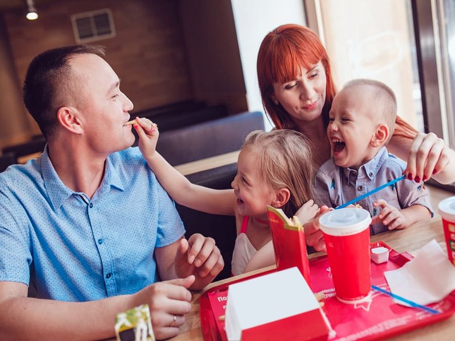 family at fast food restaurant