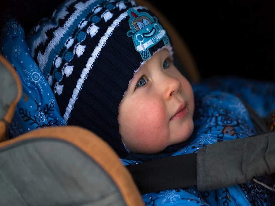 boy in carseat