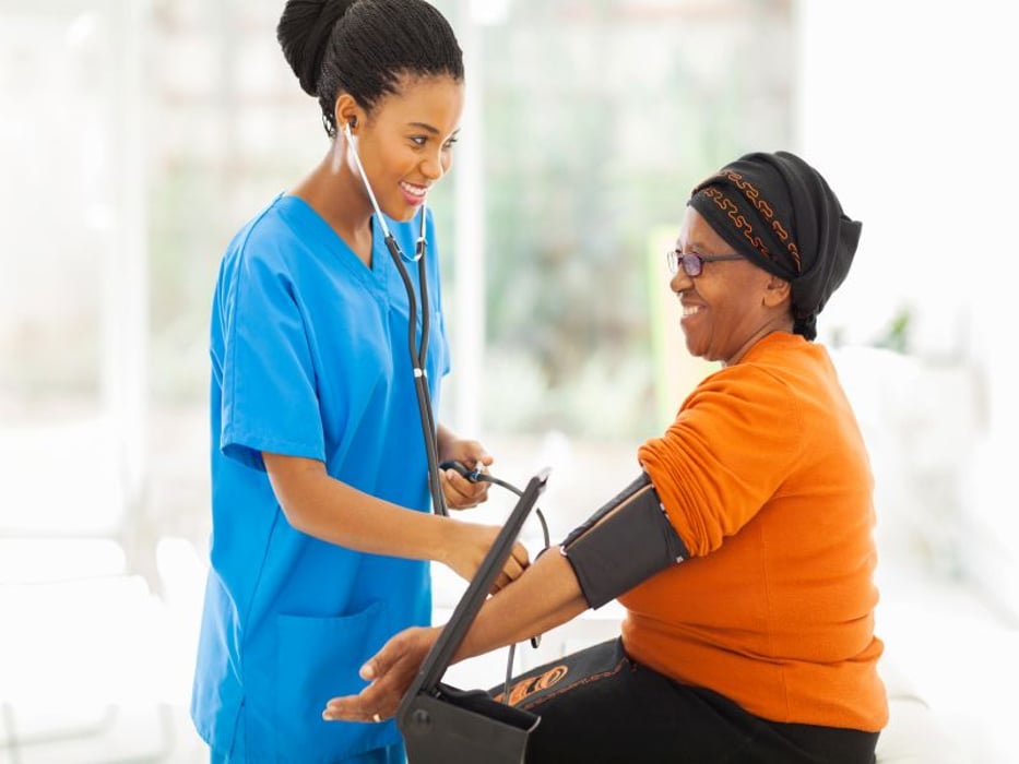 African american woman getting blood pressure checked