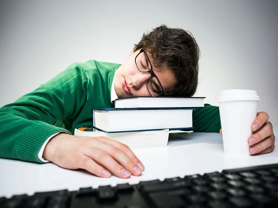 sleepy teen in school