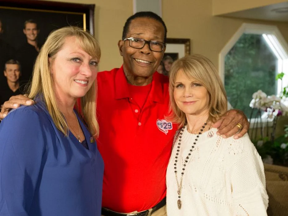 Mary Reuland (left), with Rod and Rhonda Carew (right)