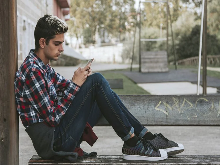 teen using phone
