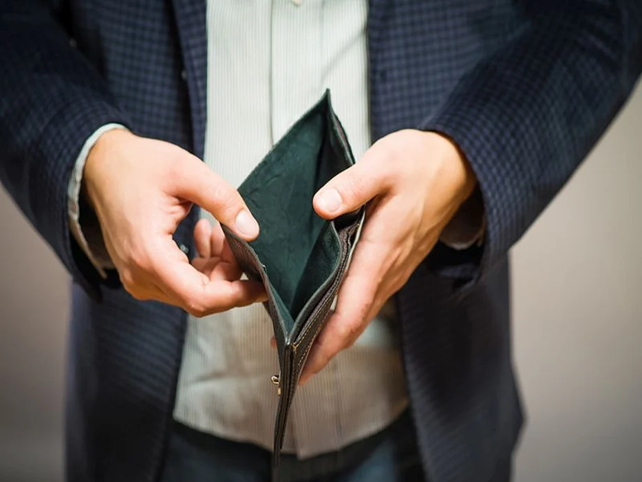 man with empty wallet