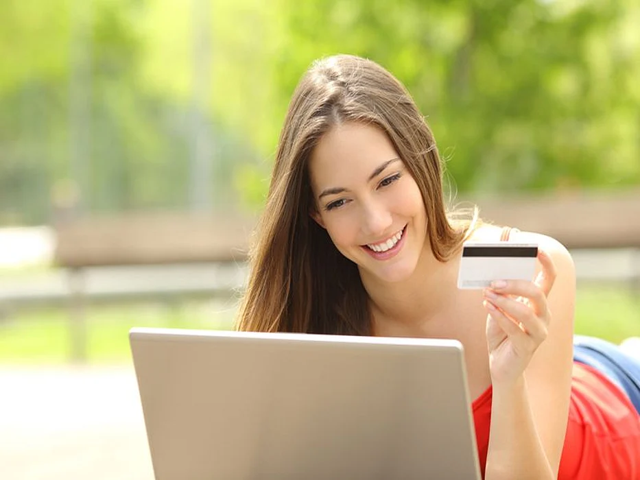 woman entering credit card