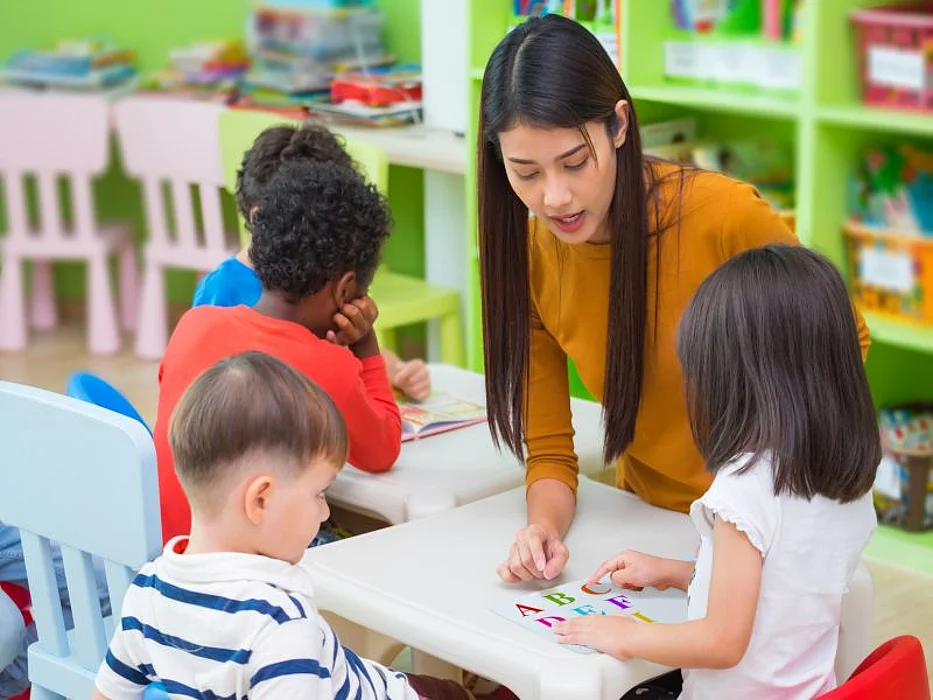 teacher and young students