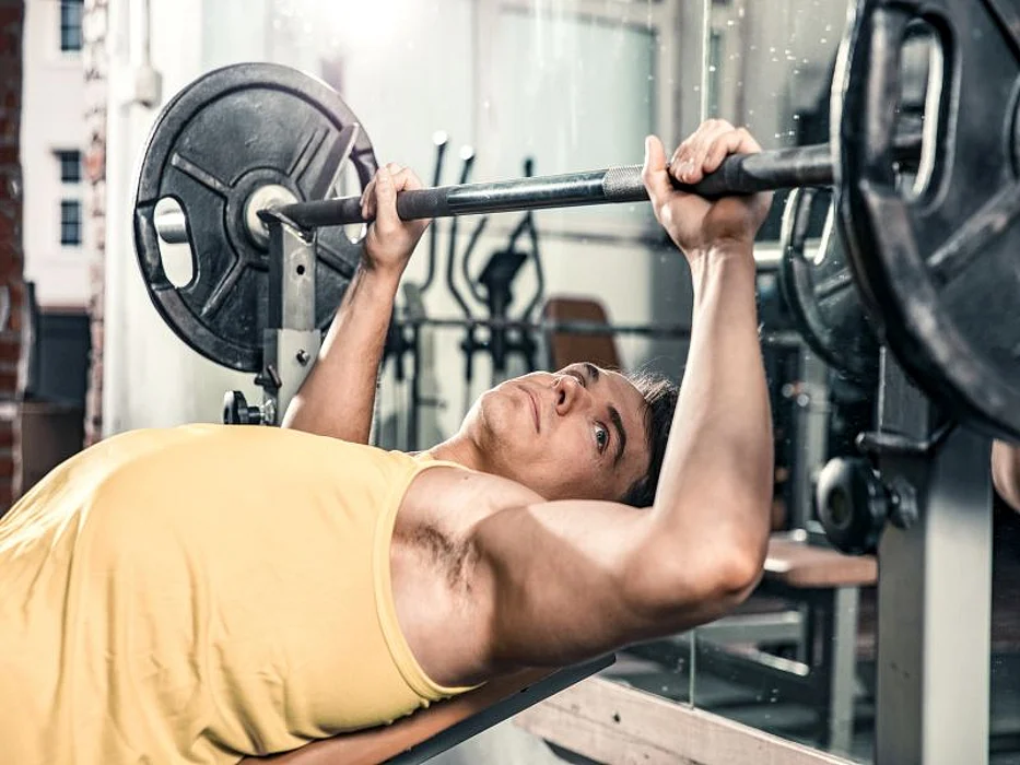 man bench pressing