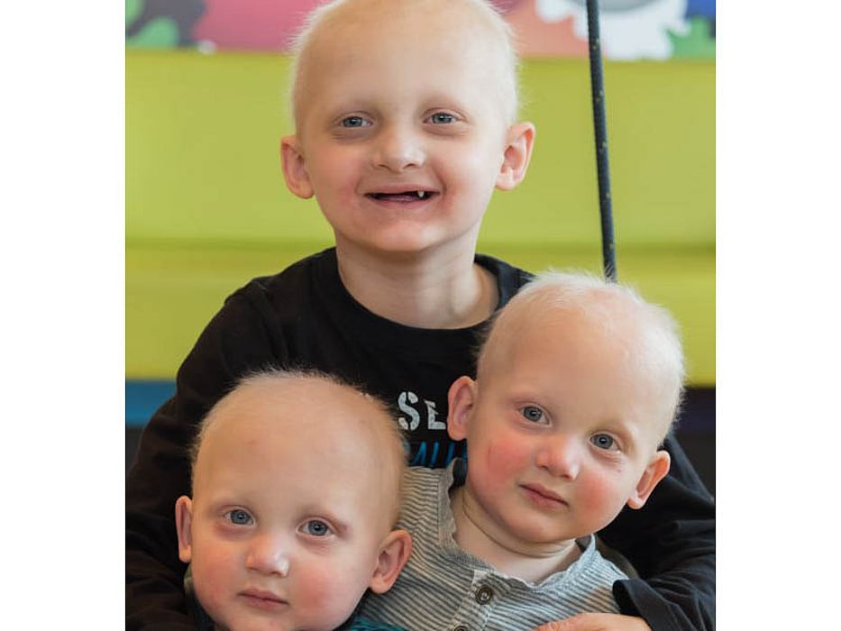 Treated twins Maarten & Linus, and older brother Joshua
