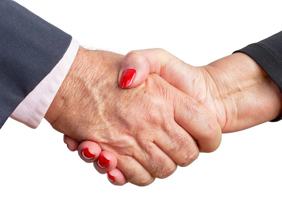 man and woman shaking hands
