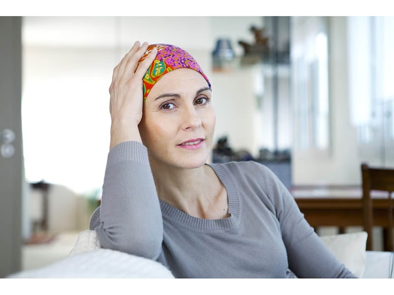 Photo of Femme heureuse qui a abandonné les reconstructions après une mastectomie – Consumer Health News