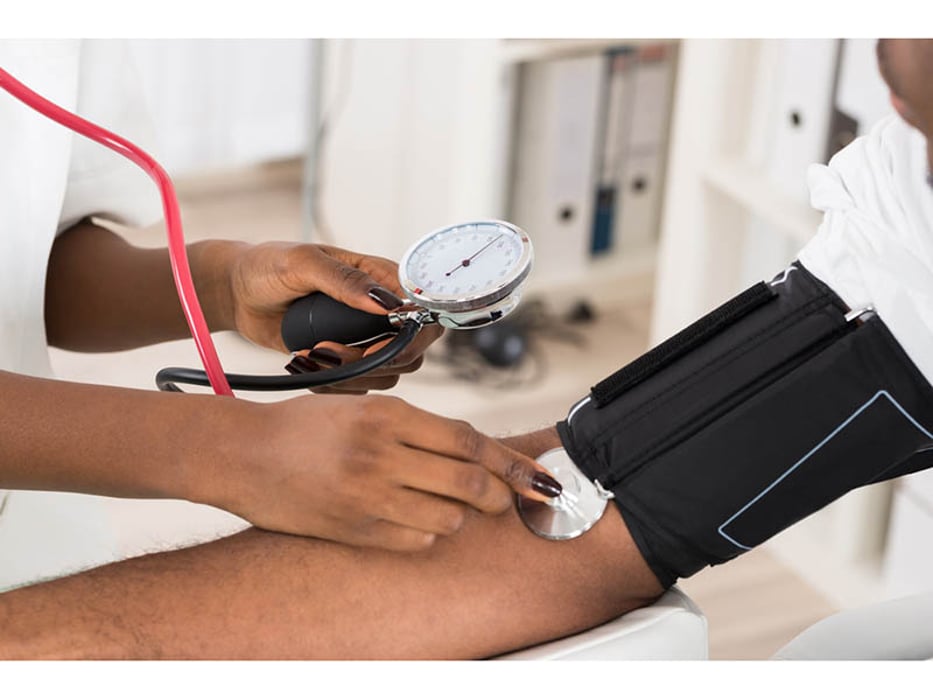 a person checking a blood pressure