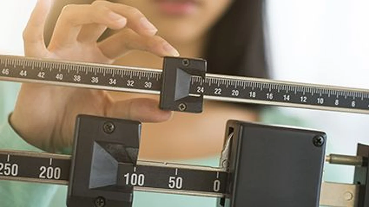 a woman on the scale