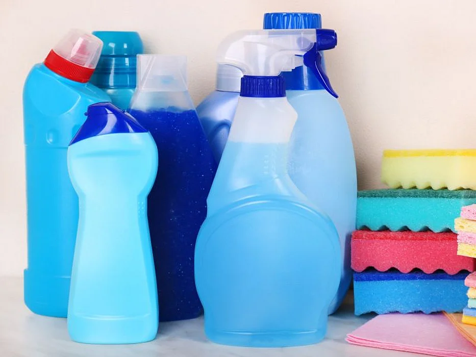 household cleaners on kitchen shelf