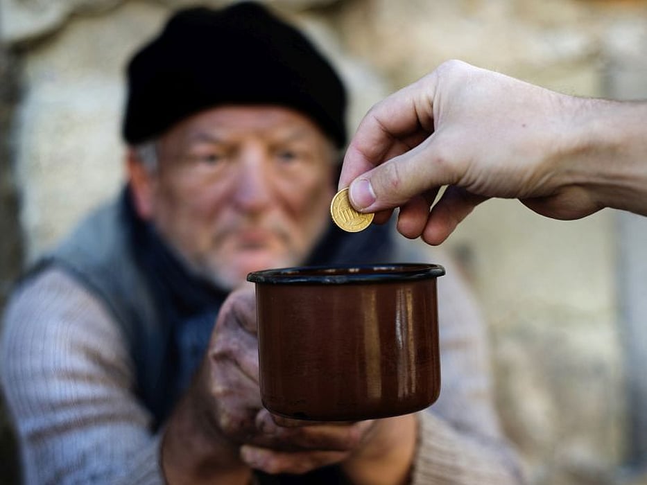 Giving money to a homeless person