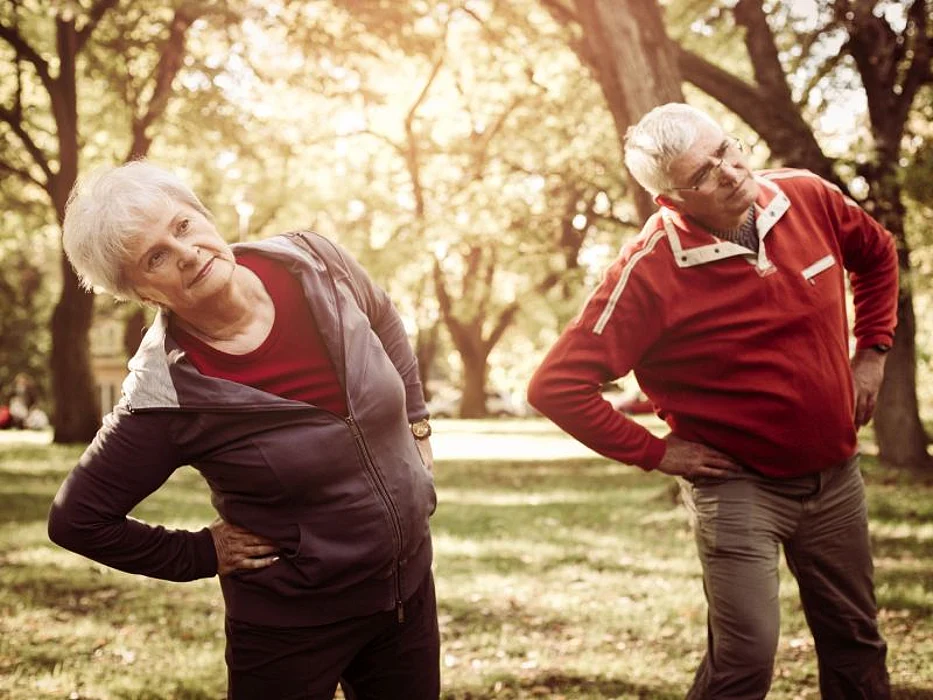 senior couple stretching