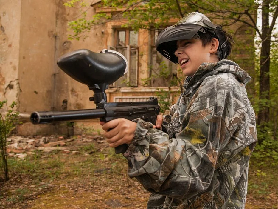 Boy with paintball gun