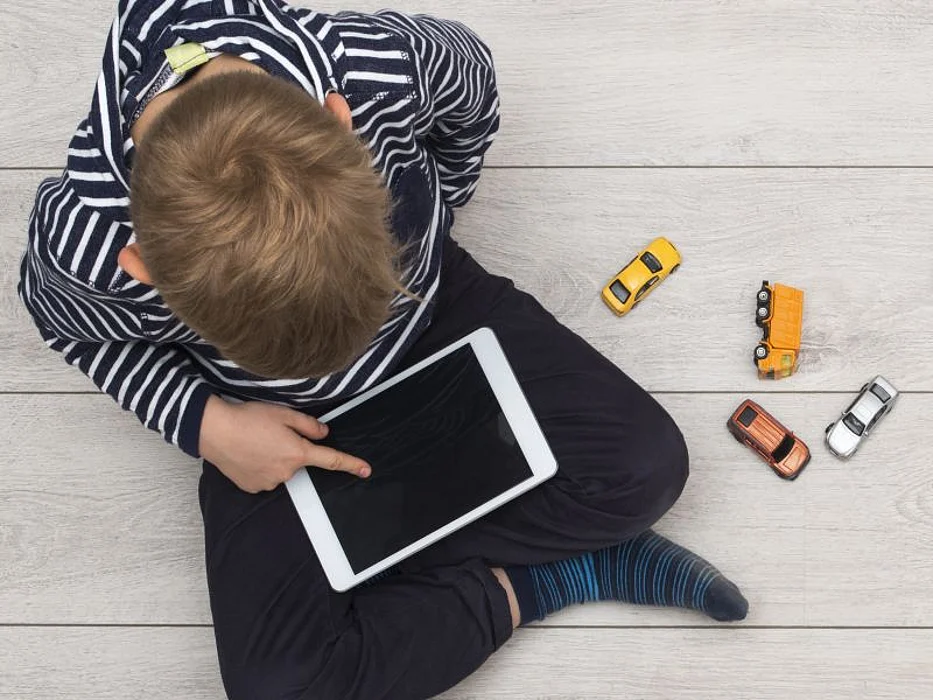 boy using ipad