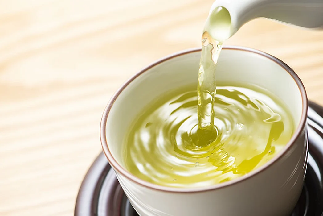 green tea being poured