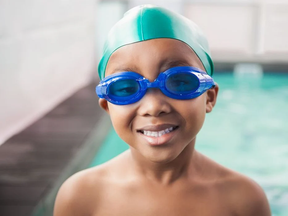 African American boy swimming