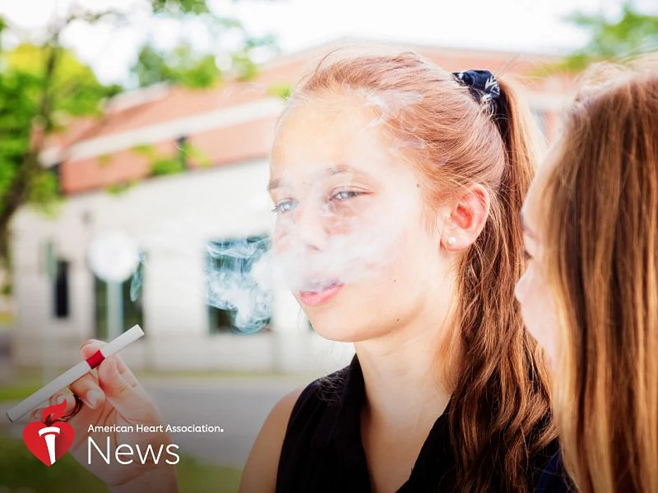 a young girl vaping